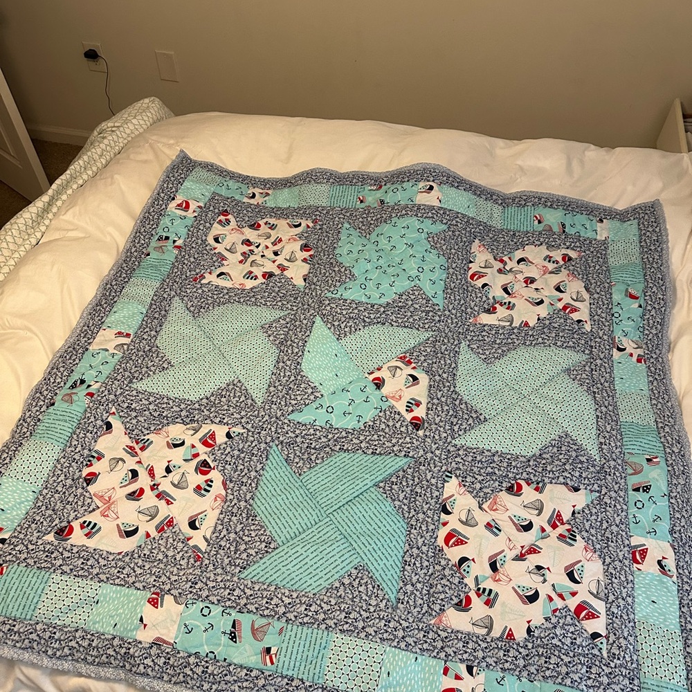Handmade nautical infant/toddler Quilt with Blue and White Patterns